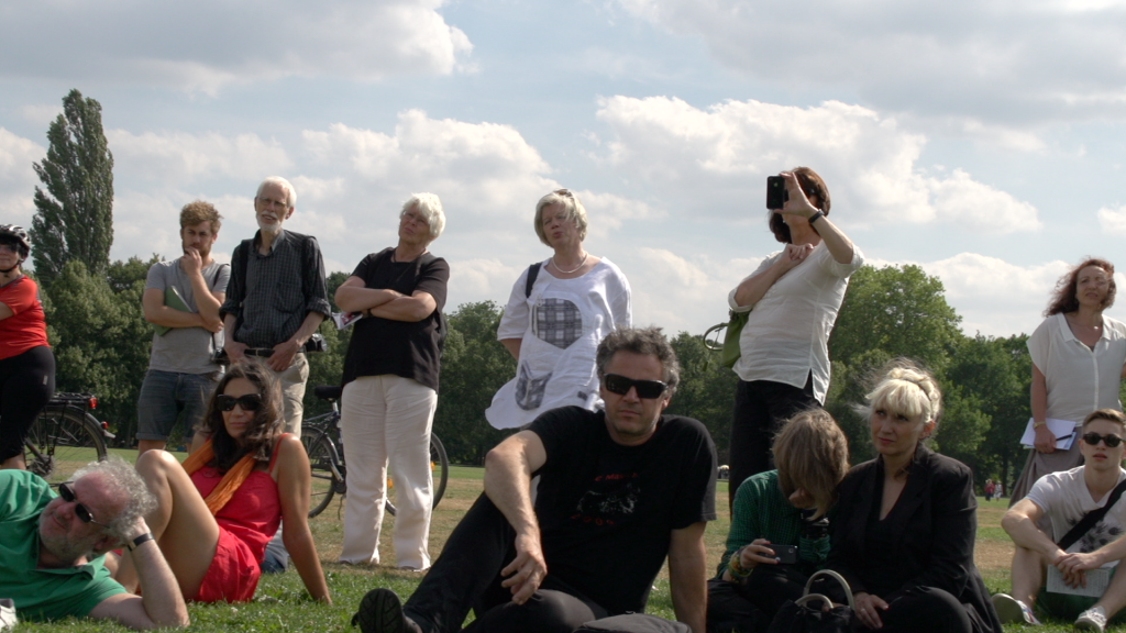 documenta visitors listening Namlings concert at Karlsaue garden